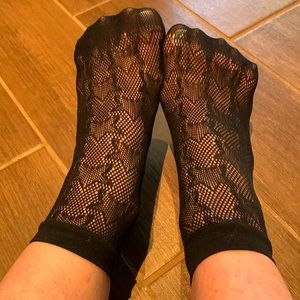 Fun little fishnet ankle socks with stars. Perfect condition. Medium.